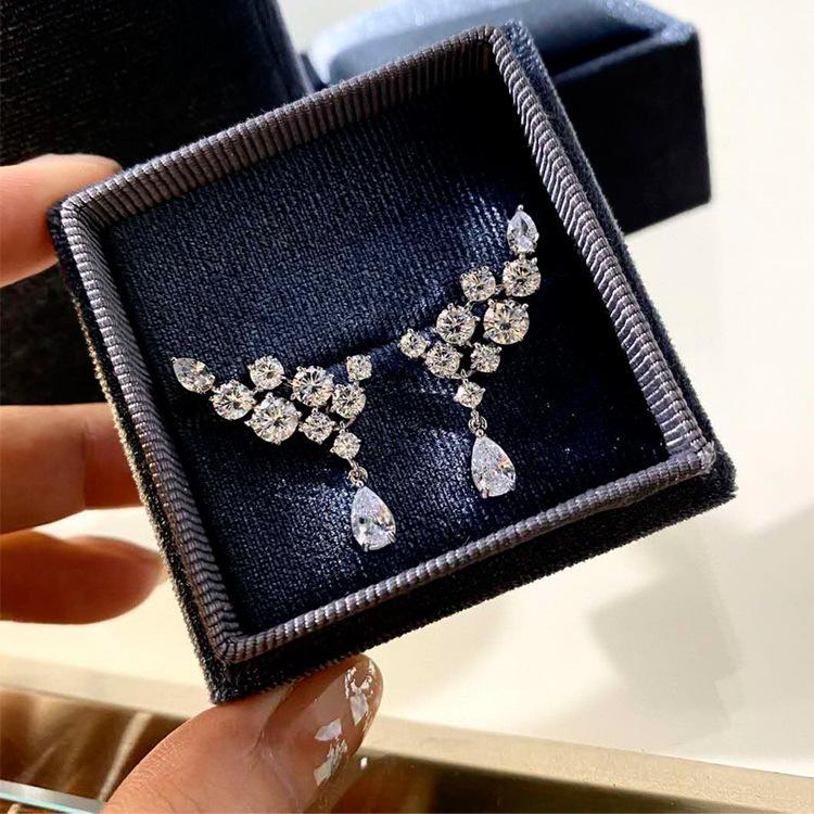 Luxury Pear Cut Drop Created White Sapphire Earrings In Sterling Silver
