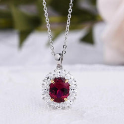 Ruby Oval Cut Halo Pendant with Necklace In Sterling Silver