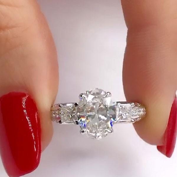 3.5 Carat Oval Engagement Ring with Two Princess Sidestones